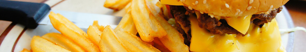 Eating Burger Pub Food at Station Tavern restaurant in San Diego, CA.